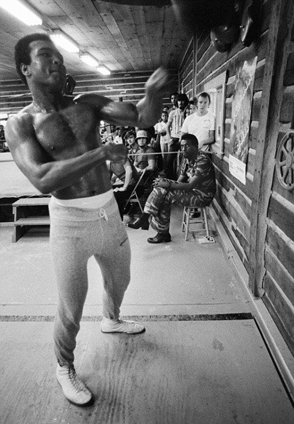 A vintage photo of a boxer training in a gym.
