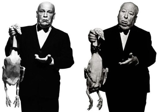 A radass man in a suit holding a bird for the Best of the Week recap.