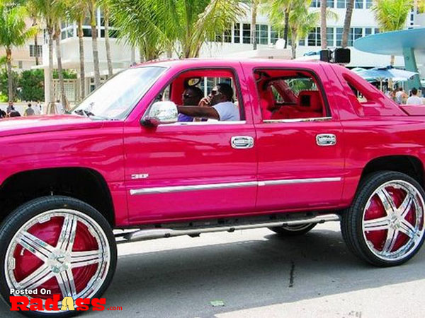 Pink Chevrolet Avalanche truck.