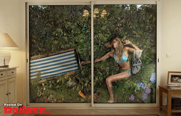 A cool image of a woman in a bikini posing against a sliding glass door. [50 PICS]