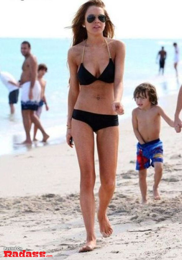 Did you see that woman walking with her son on the beach?
