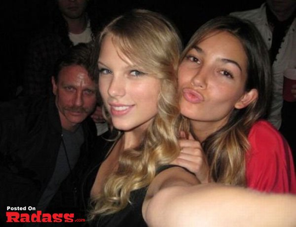 Taylor Swift photobombs celebrity style at a party.