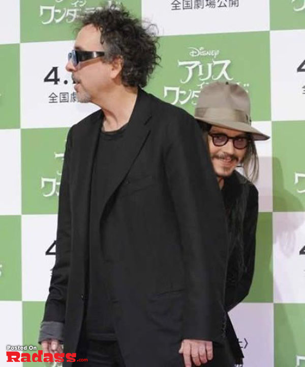 Johnny Depp and Robert De Niro photobomb the Disney World premiere in Tokyo, adding their celebrity style.