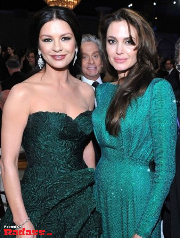 Angelina Jolie photobombs celebrity style at the Oscars.