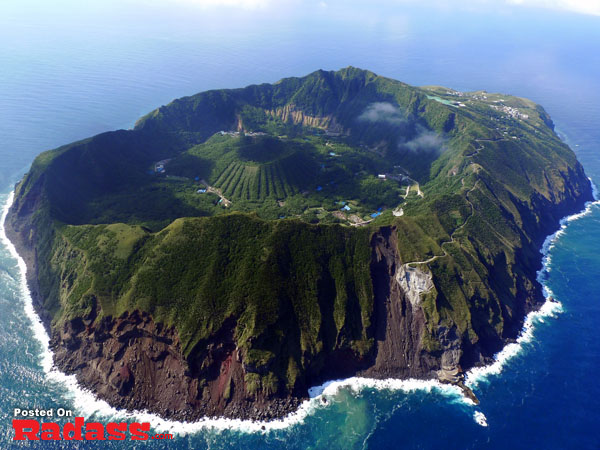 An isolated island seen from the sky, offering an escape from civilization.