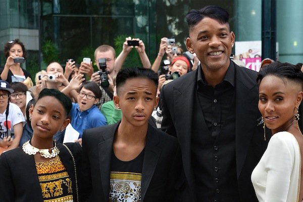 Will Smith and his family pose for a photo with Kim Jong-Un's haircut