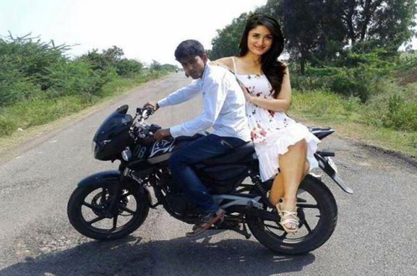 A man and a woman on a motorcycle showcasing amazing Photoshop skills.