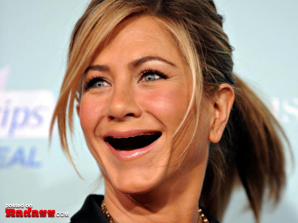 Jennifer Aniston grins toothlessly.