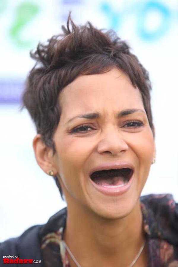 Halle Berry, toothless, laughing at an event.