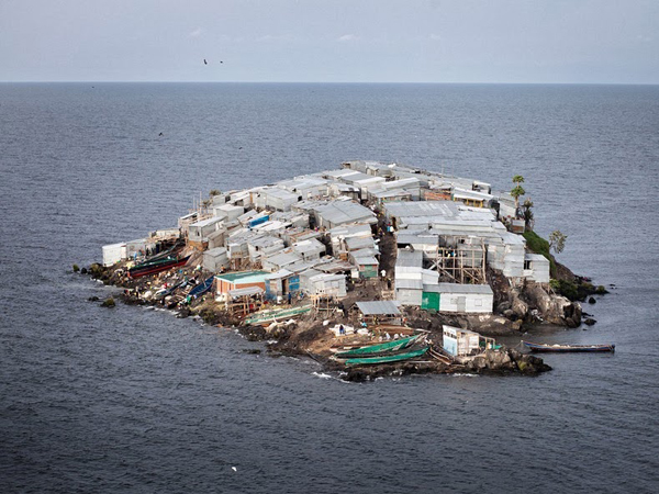 A small island half the size of a football field with houses that can accommodate up to 1500 people in the middle of the ocean.