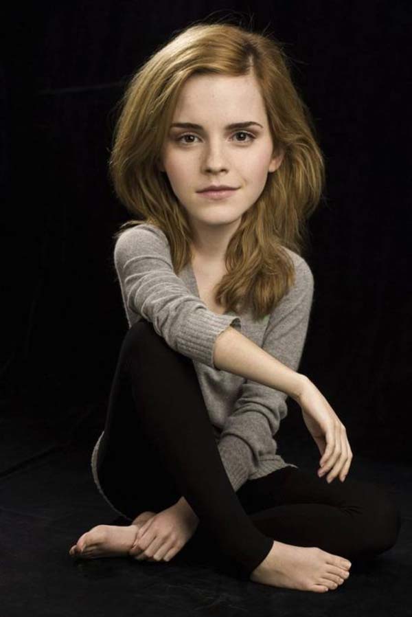 Emma Watson sitting floor.
