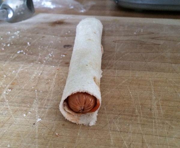 A tortilla-wrapped hot dog, essential for college students surviving on 16 meals.