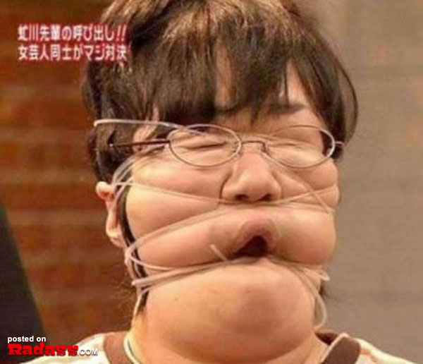 A woman with her face tied up in a WTF Japan moment.