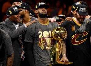 The Cleveland Cavaliers triumphantly showcase the NBA championship trophy, immortalizing their victory in Photoshop.