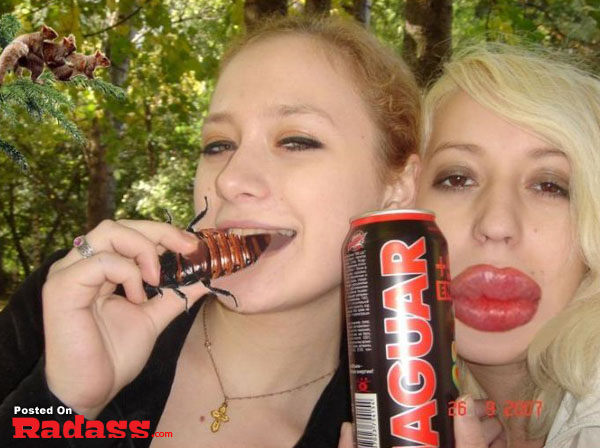 Two women posing for a picture with a can of jaguar, showcasing the transformative power of Photoshop.
