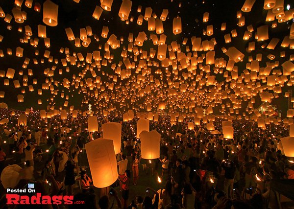 A crowd of lanterns floating in the air.