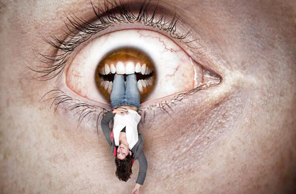 An image of a woman with an eye in the air, showcasing Photoshop artistry.