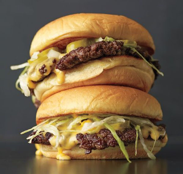 A creative and mouthwatering combination of two succulent cheeseburgers, perfect for your 2022 burger adventures.