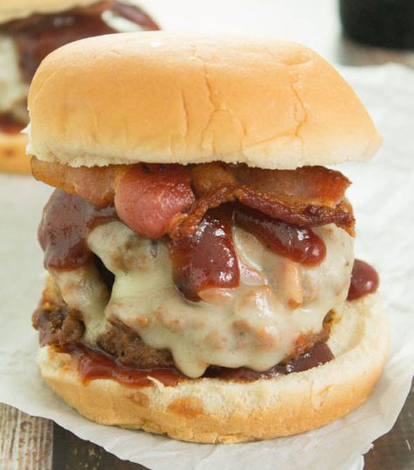 An awesome burger idea for 2022 featuring bacon and cheese.