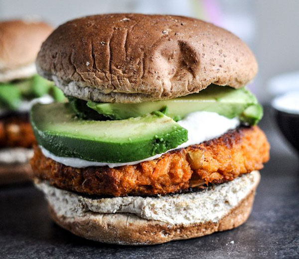 Sweet potato burgers with avocado and sour cream - an awesome vegan burger idea for 2022.