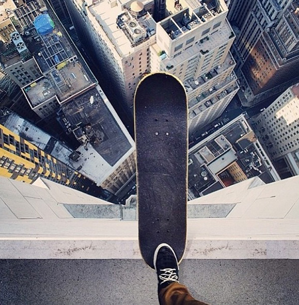 40 Cool Pics of a Skateboarder Enjoying the View of a City