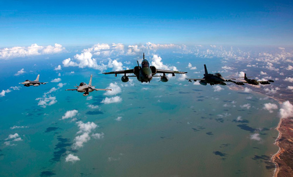 40 Cool Pics of military jets flying over the ocean to make your day.