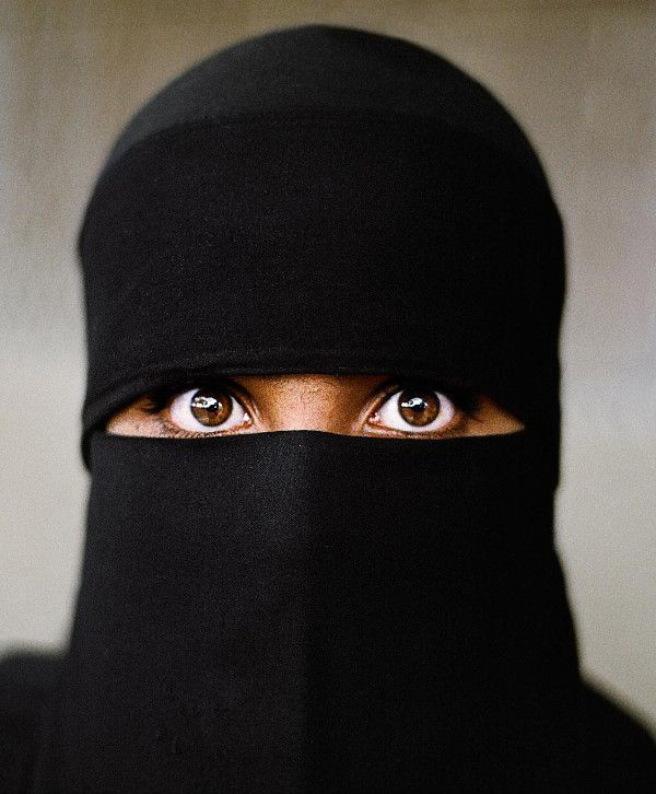 A woman wearing a black veil with brown eyes in 40 Cool Pics Just To Make Your Day.