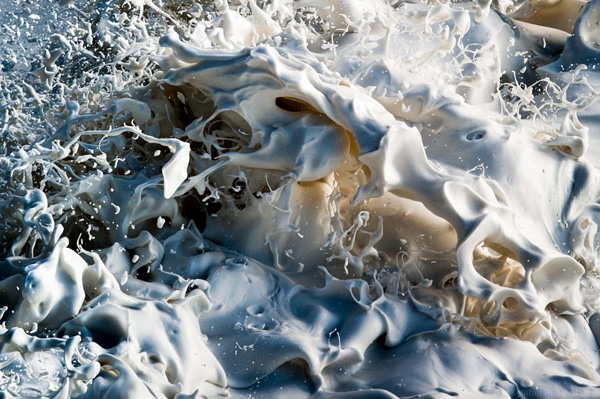 40 Cool Pics of a white liquid splashing into the water, guaranteed to make your day.
