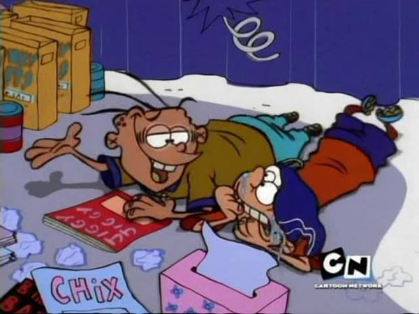 Two cartoon characters are laying on the floor in front of a box, with hidden dirty jokes.