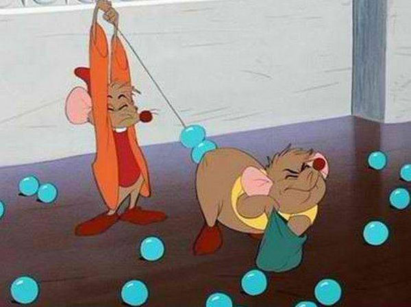 Two cartoon characters are innocently playing with balls in a room, unbeknownst to them that dirty jokes are hidden within their child-friendly world.