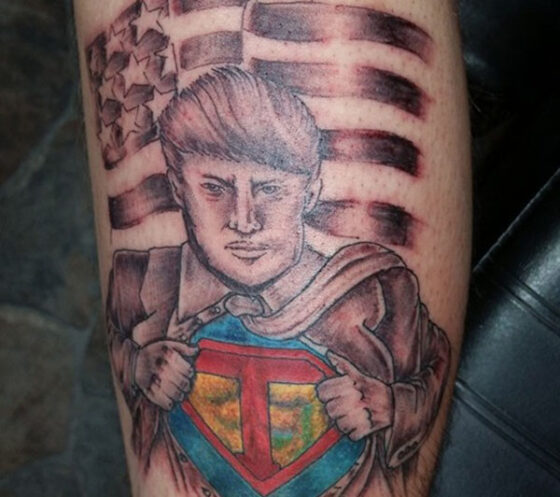 A ridiculous tattoo featuring a man with an American flag on his leg.
