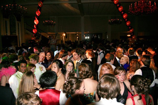 A group of people at a prom dance have a hilarious encounter as Michelle Obama hugs George W. Bush, causing the Photoshop pros to have a field day with the memorable moment (15 Photos).