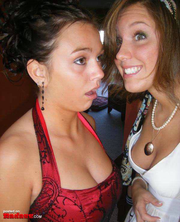 Two women posing for a picture, sharing a playful expression that says 