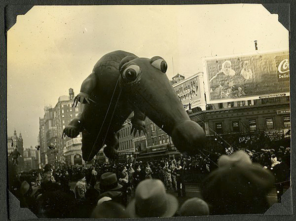 An old photo of a large crocodile float at the Macy's Day Parade.