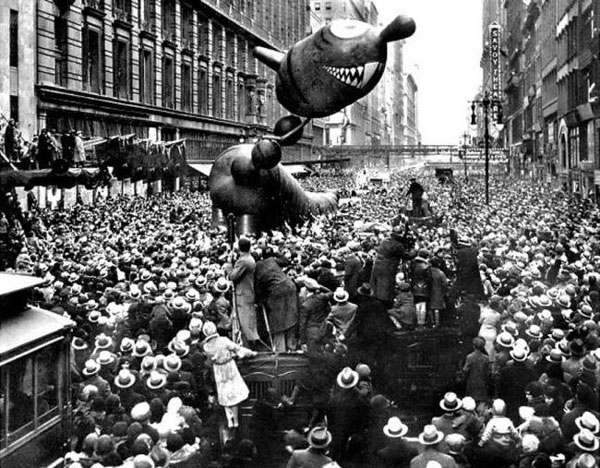 Macy's Day Parade started with a large crowd of people in a street.