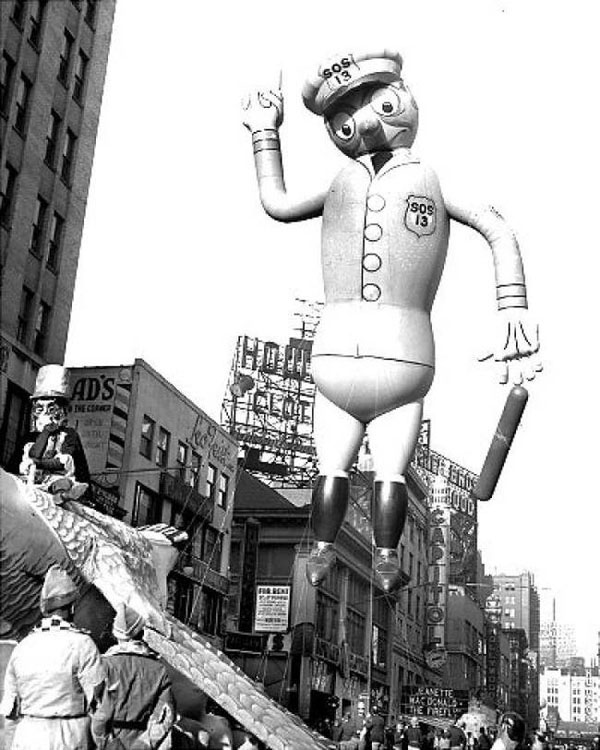 Macy's Day Parade featured a large inflatable balloon in the air, marking the event with a touch of whimsy.