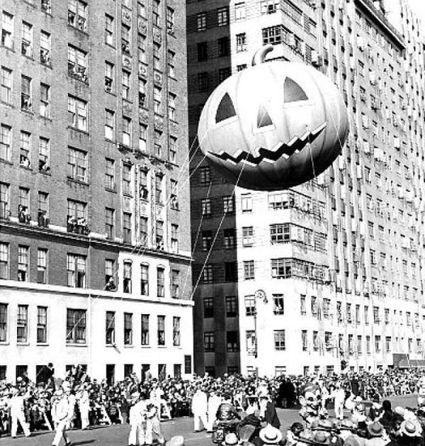 A large pumpkin shaped balloon in the Macy's Day Parade.