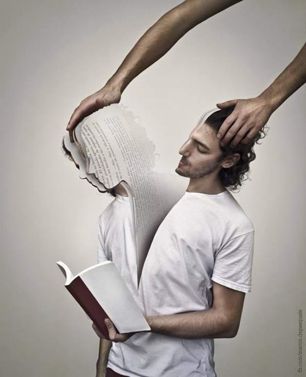 A man is holding a book over his head, showcasing Martín De Pasquale's Photoshop skills.