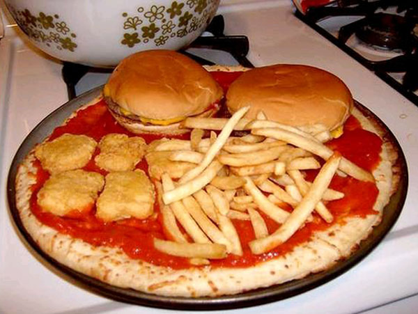 A pizza with burgers and fries, a meal known well by college students.