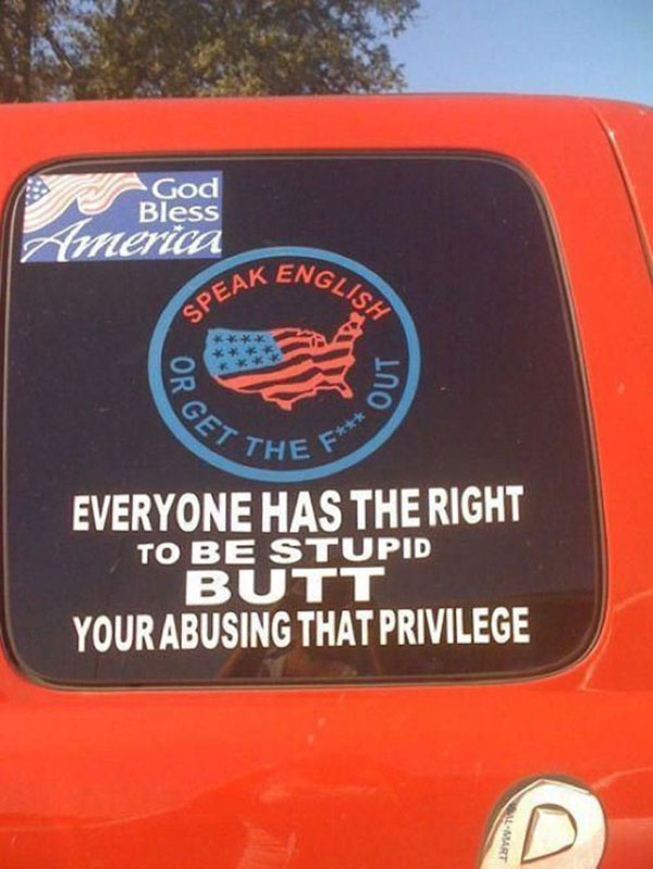 A red truck with a sticker that says everyone has the right to butt you 18 times.