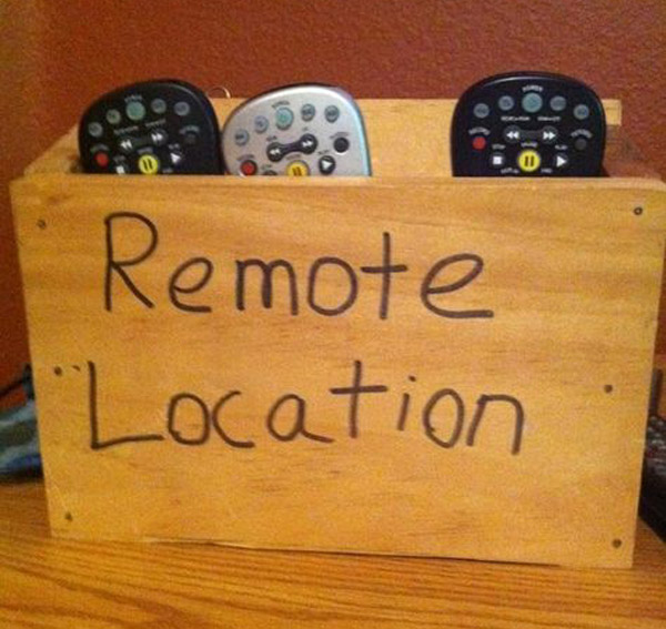 Three remotes in a wooden box with That's So Pucking Punny engraving.