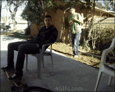 A man sitting on a chair with a skateboard experiences 15 Times When Life Says No.
