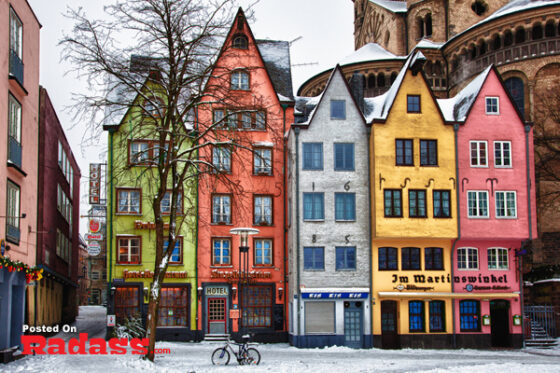 A row of beautiful buildings with a bicycle parked in front, captured in high-quality photographs.