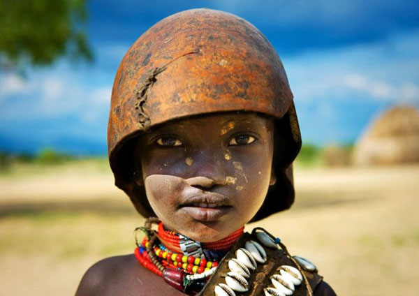 An Ethiopian girl wearing a helmet in truly captivating photographs.