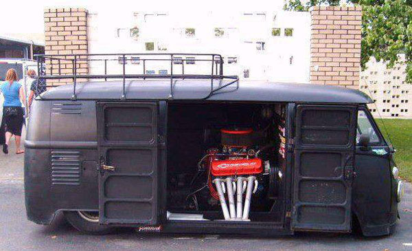 Just Cool Ass Cars & Trucks: A black van with a large engine in the back.