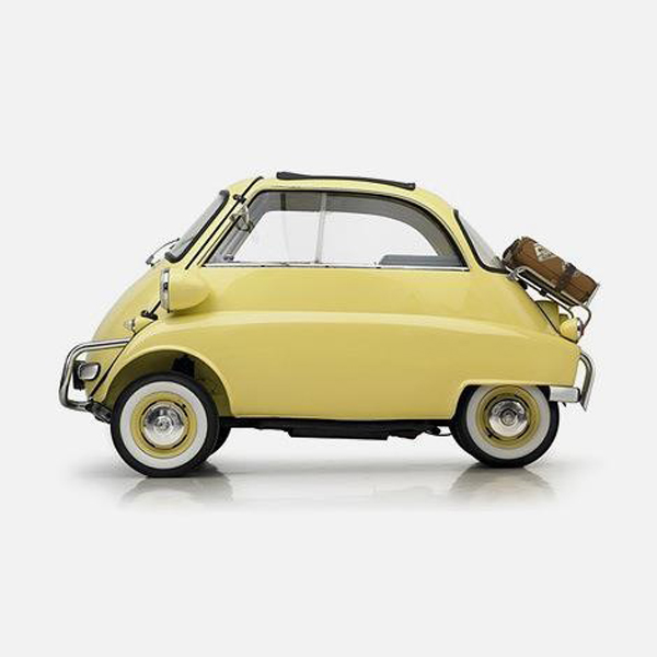 A cool yellow car on a white background.