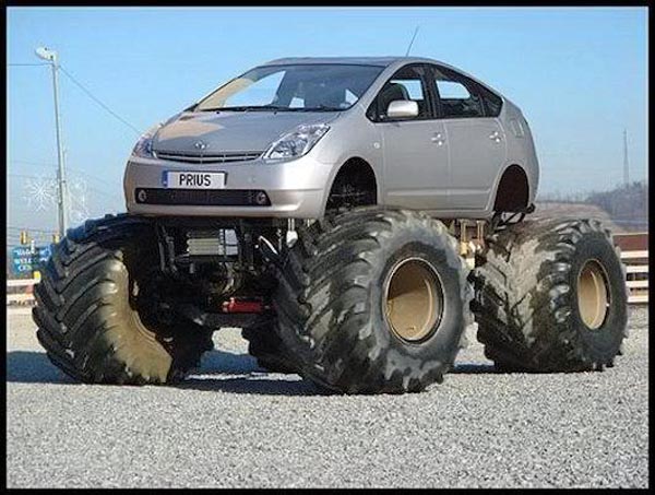 A Toyota monster truck with large tires is a cool and badass vehicle.
