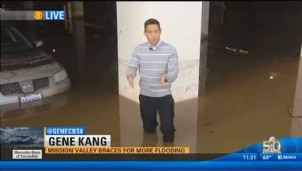 A California man standing in a flooded parking lot at the Fashion Mall has a bad day.