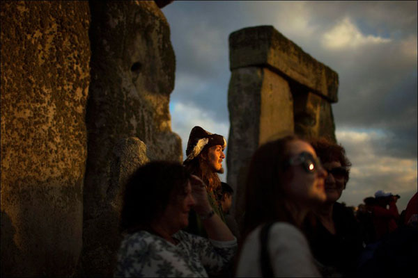 A Beautiful World: People at Stonehenge.