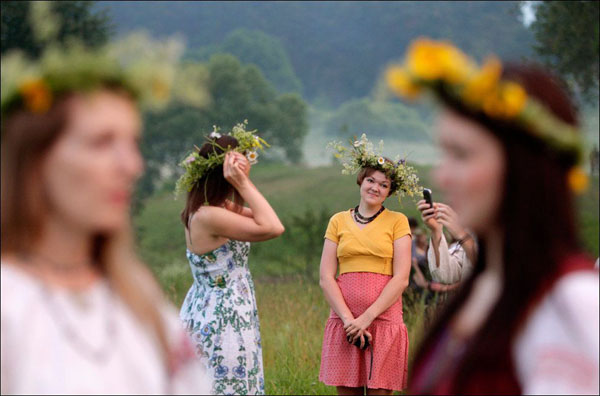 A group of Flower Crowned women in a Beautiful field.